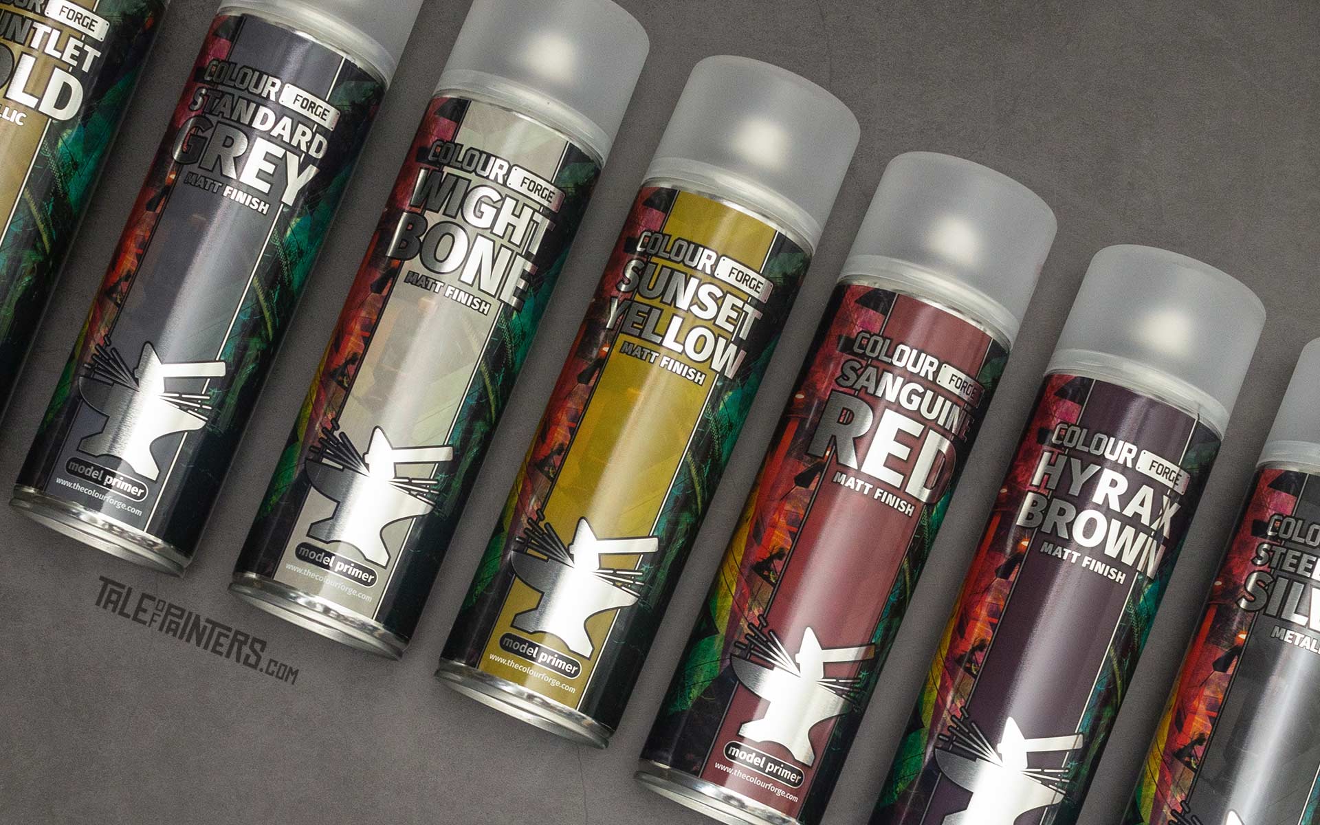 Colour Forge spray paint cans on a grey background