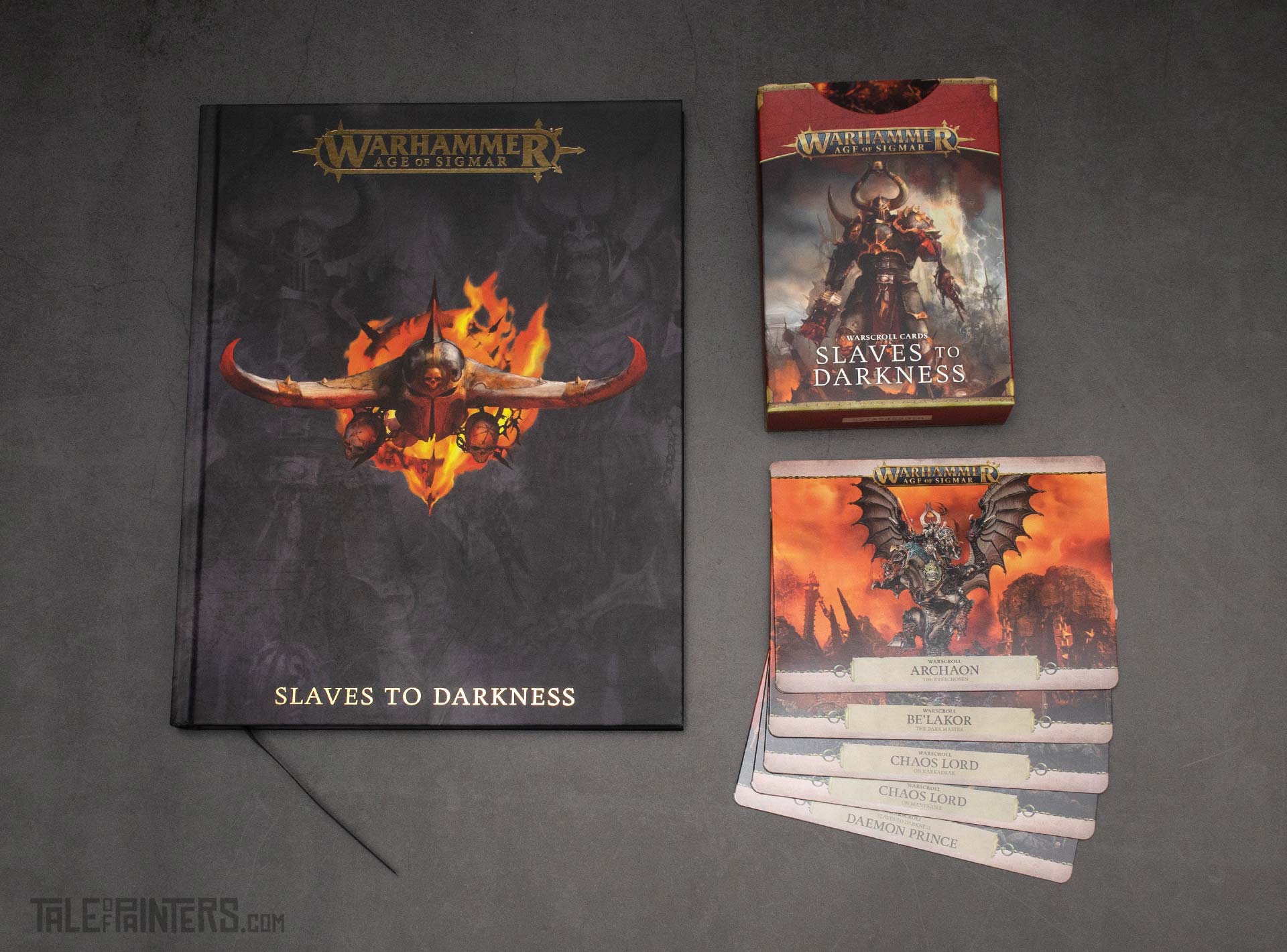 Limited edition Slaves to Darkness battletome and warscroll cards from the army set