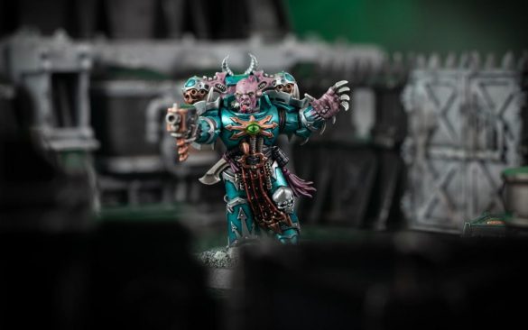 Cinematic shot of an Alpha Legion Anointed from Kill Team Nachmund, painted by Stahly.