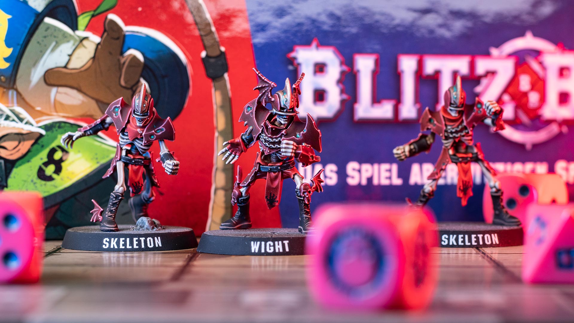 Blood Bowl Shambling Undead Skeletons and Wight in front of the game box