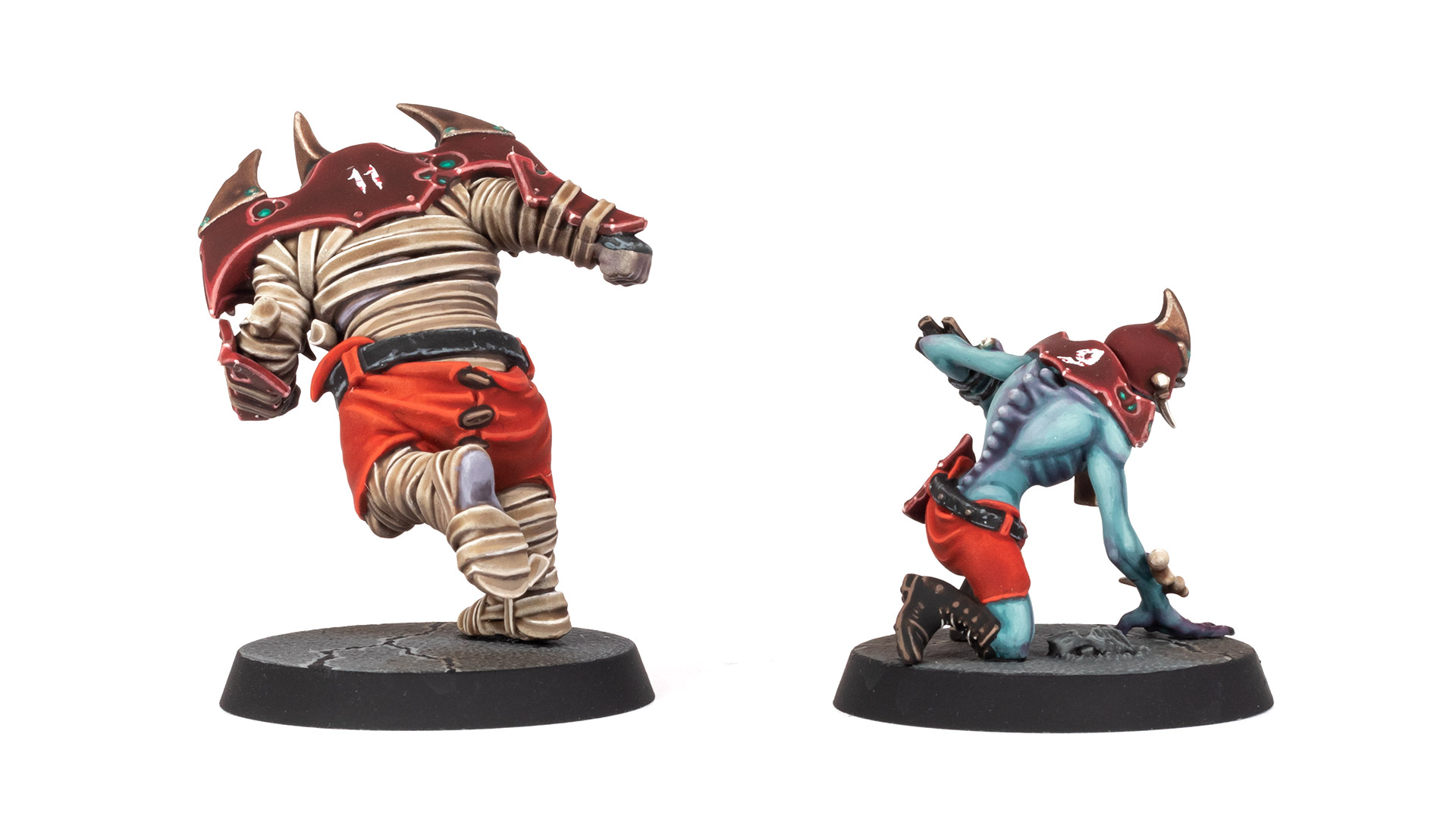 Back view of a Shambling Undead Mummy and Ghoul from Blood Bowl, painted by Stahly
