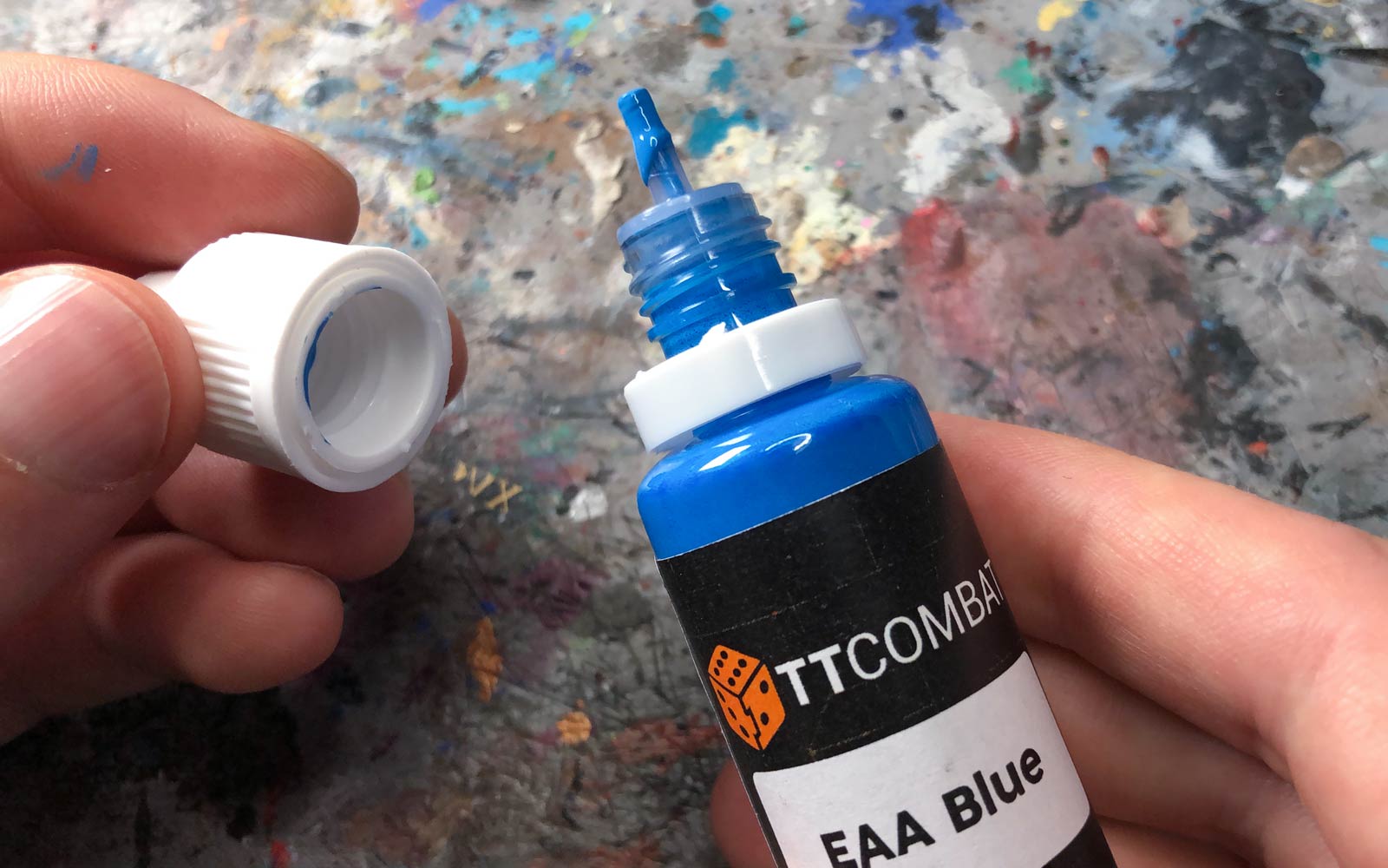TTCombat paints nozzles and child-proof lids