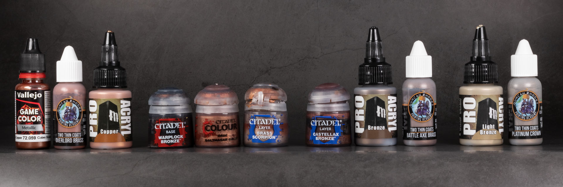 The best copper, bronze, and brass metallic paints for painting Warhammer miniatures selected by Stahly