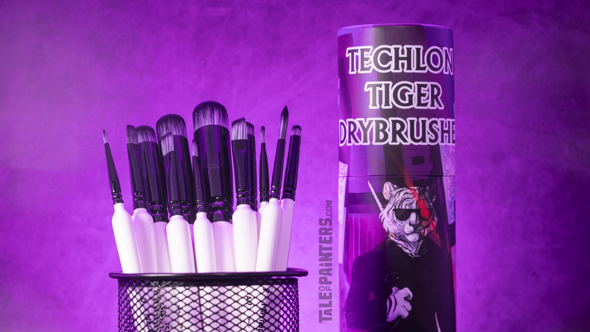 Chronicle Cards' Techlon Tiger Drybrush Set on a purple background, photographed for review purposes
