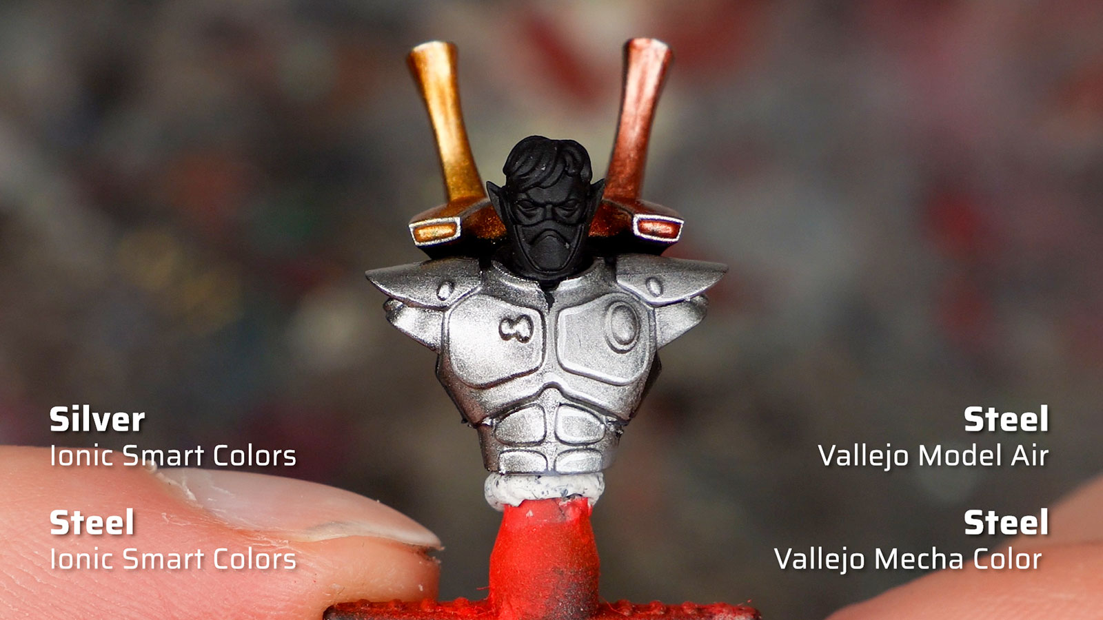 An Aeldari upper body painted as a demo model with Ionic Smart Colors metallic paints, with details in silver, gold, and copper