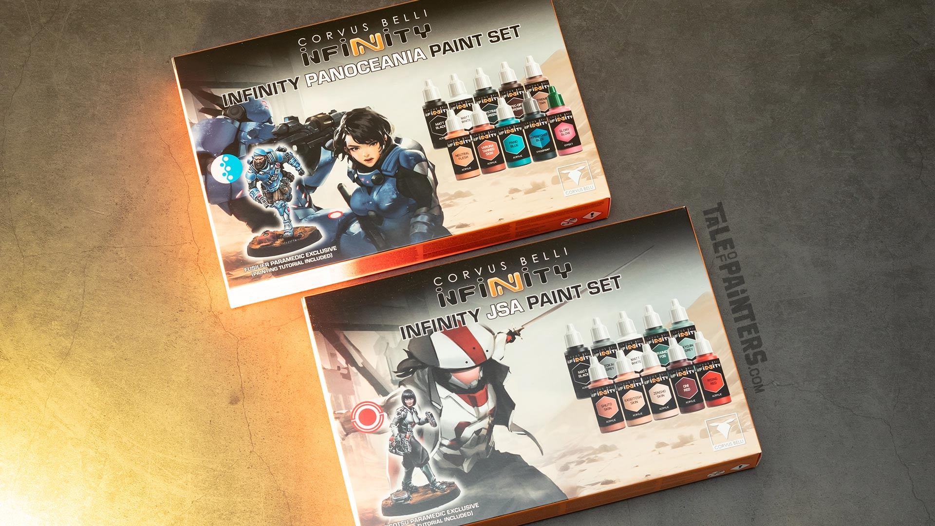 Both Infinity paint sets from The Army Painter and Corvus Belli photographed on a concrete background with orange light, shot taken for review purposes