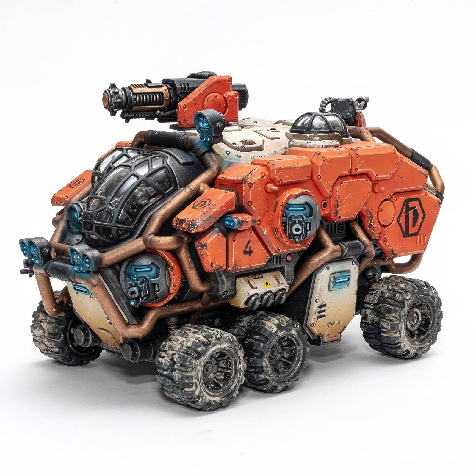 Orange painted Votann Hekaton Land Fortress by Dunk, photographed on a white background