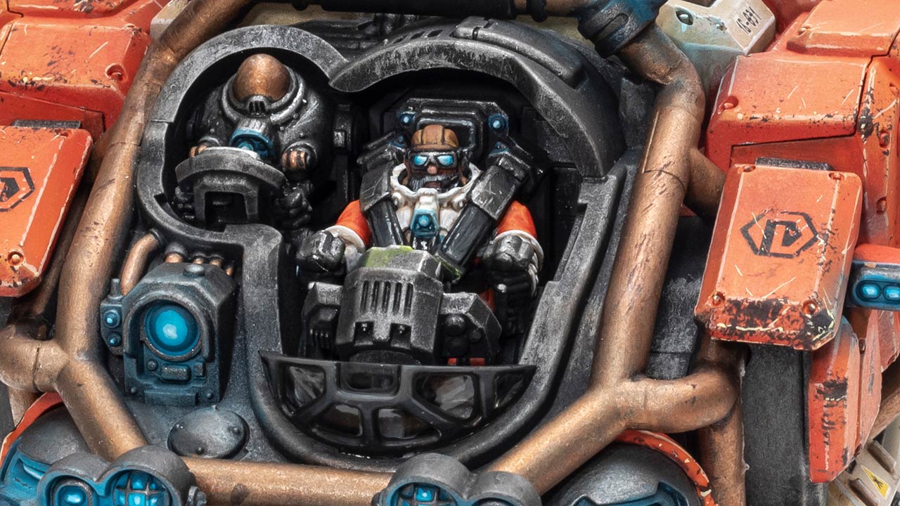 Detail shot of the cockpit of an orange painted Votann Hekaton Land Fortress