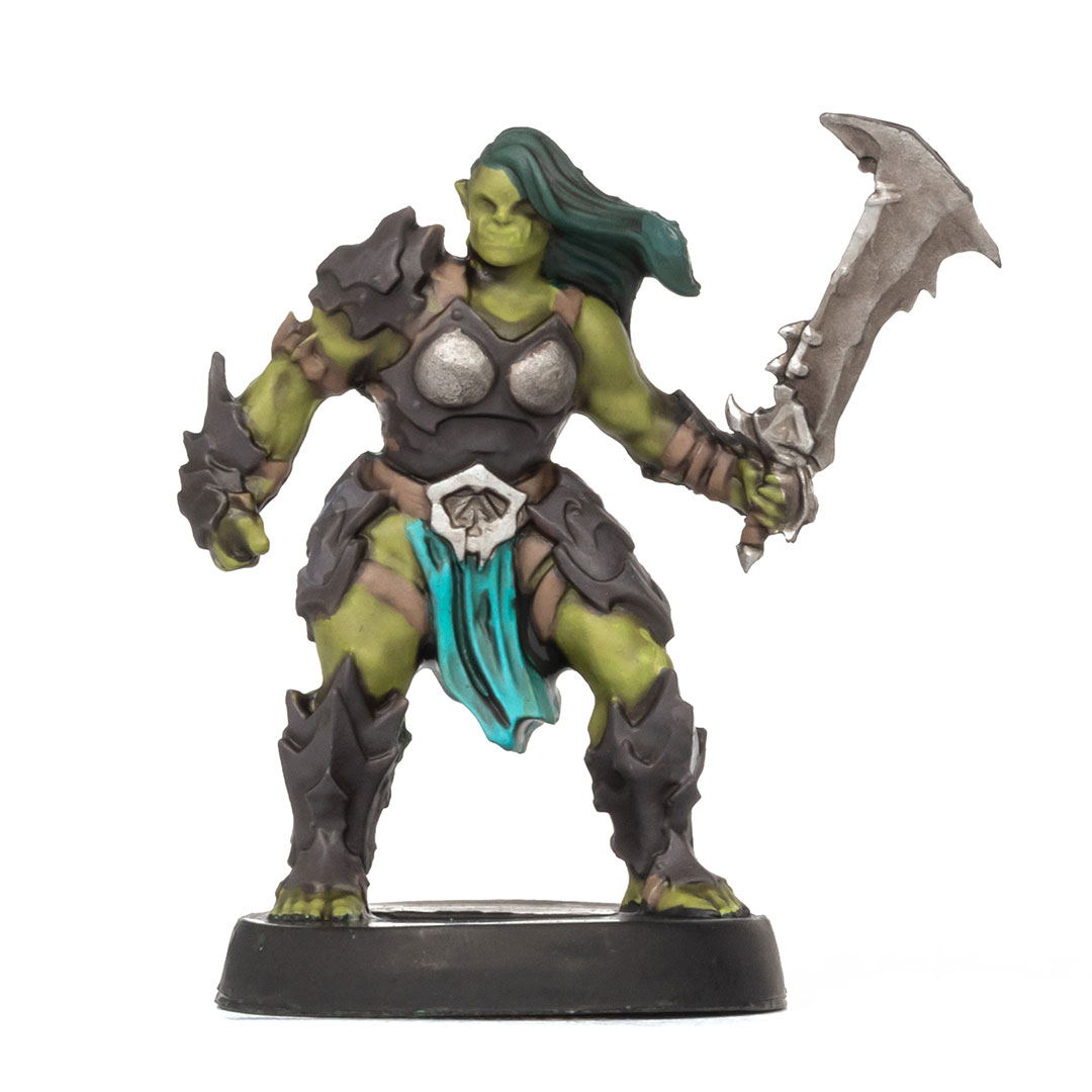 Heroquest Ork miniature painted with Real Color markers from AK and washed with black on a white background