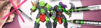 Two Heroquest Ork miniatures in front of a white circle, surrounded by various floating miniature paint markers and a crossed out hand with brush