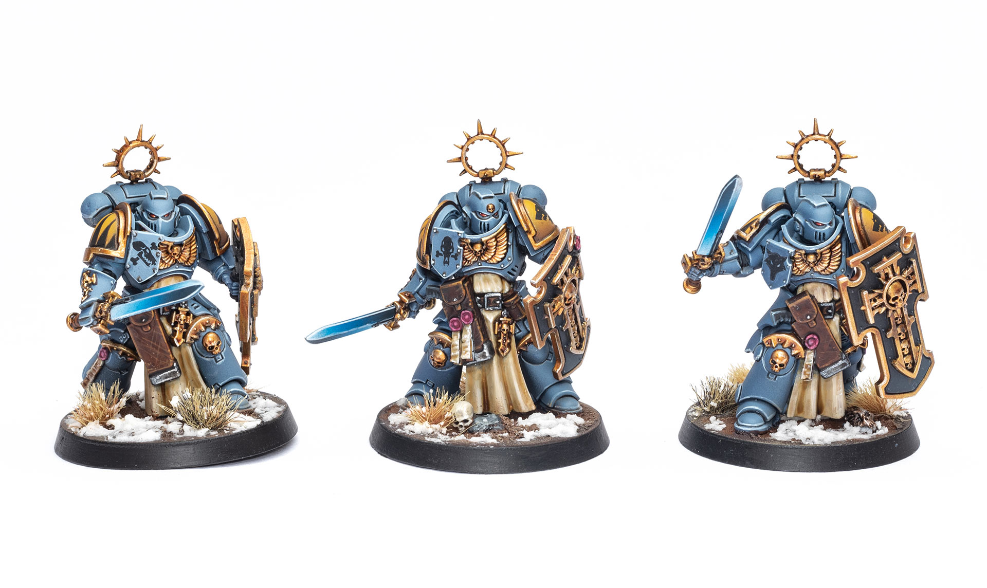 Three Space Wolves Bladeguard models on a clean white background, painted by Dunk
