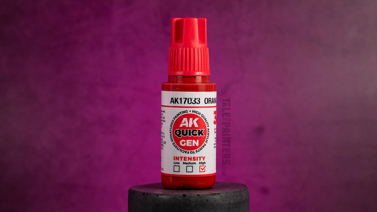 AK Quick Gen paint bottle "Orange" on a concrete podestal in front of a pink lit background, photographed for review purposes