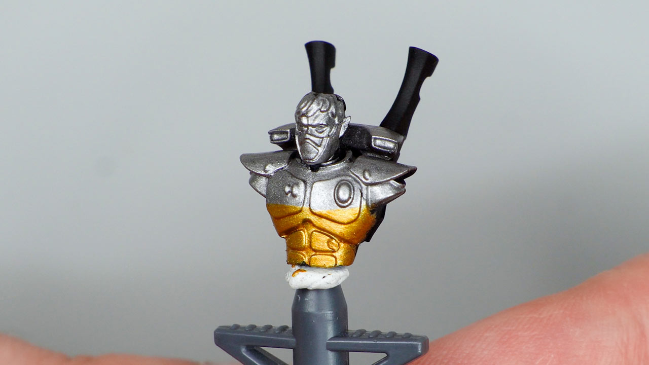 An Aeldari Guardian test model upper body painted with Cold Steel and Solid Gold metallic paints from P3