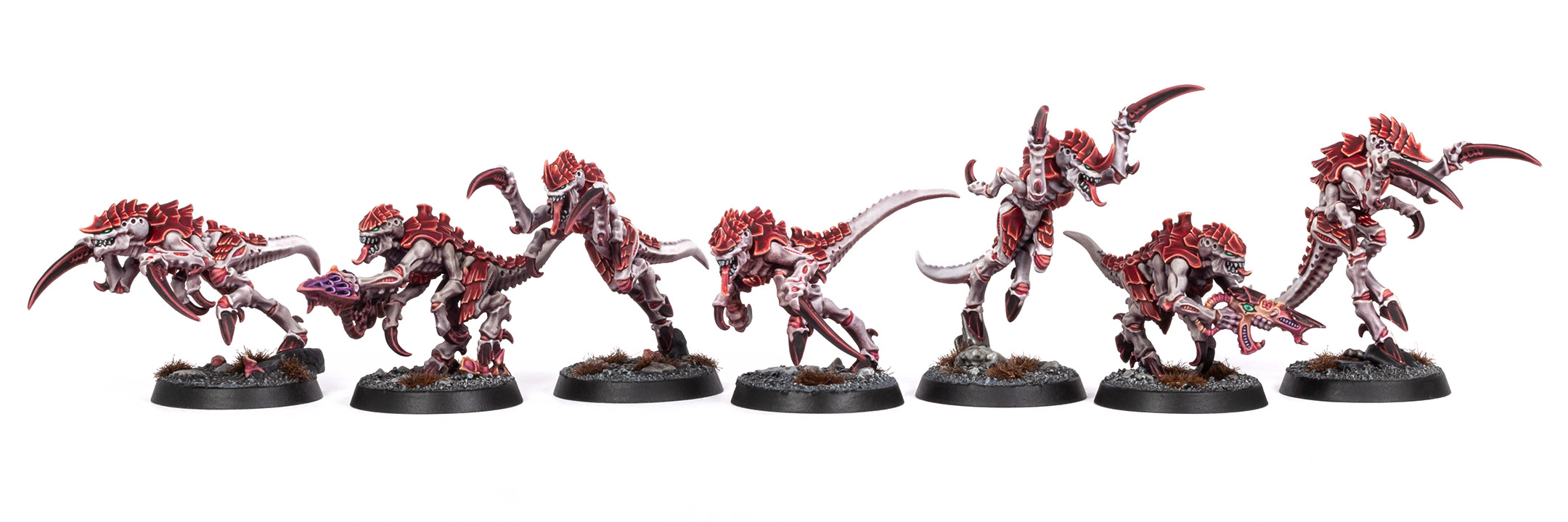 Five Hormagaunt and two Termagant models painted in Hive Fleet Kraken colours by Stahly, arranged on a white background
