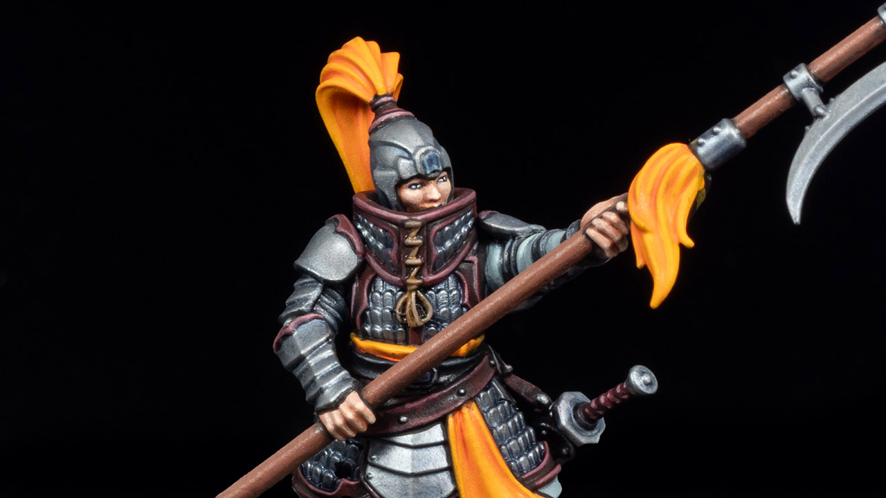 Close-up of a Cathay Jade Warrior with yellow sashes on a black background, painted by Stahly