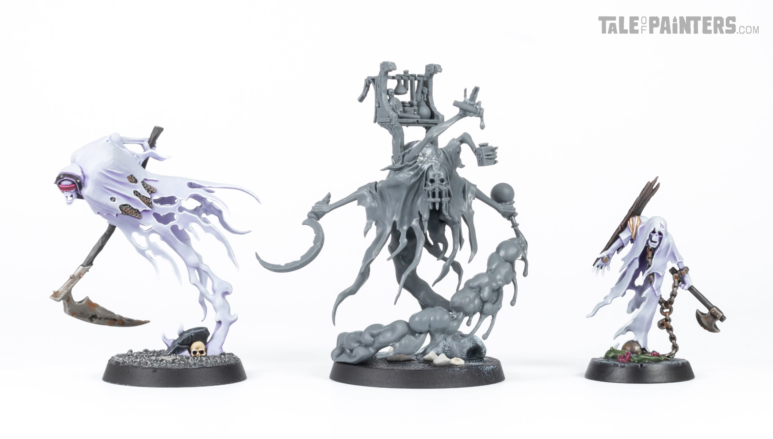 A Nighthaunt Grimghast Reaper, Lord Vitriolic, and Chainrasp lined up on a clean white background