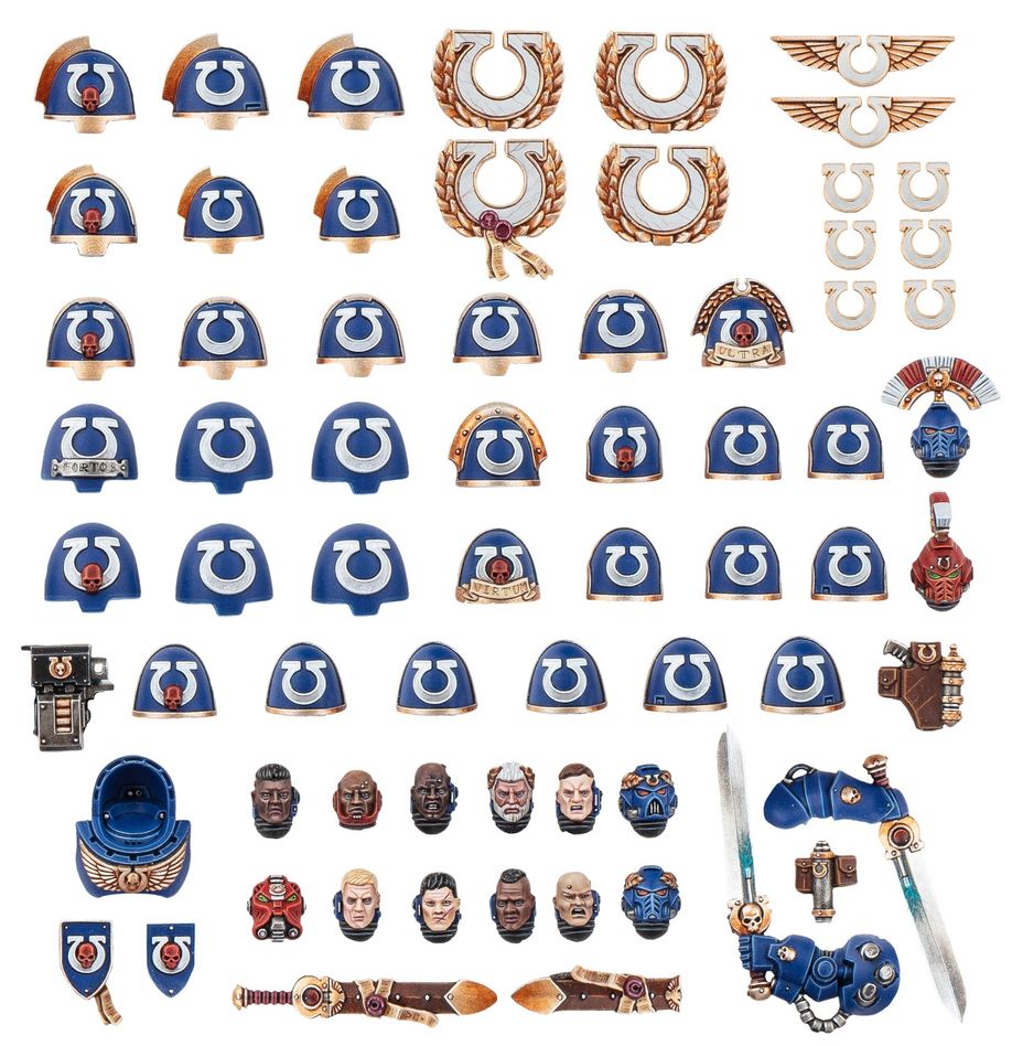 Contents of the 2025 Ultramarines Upgrades and Transfers kit, painted and arranged on a white background