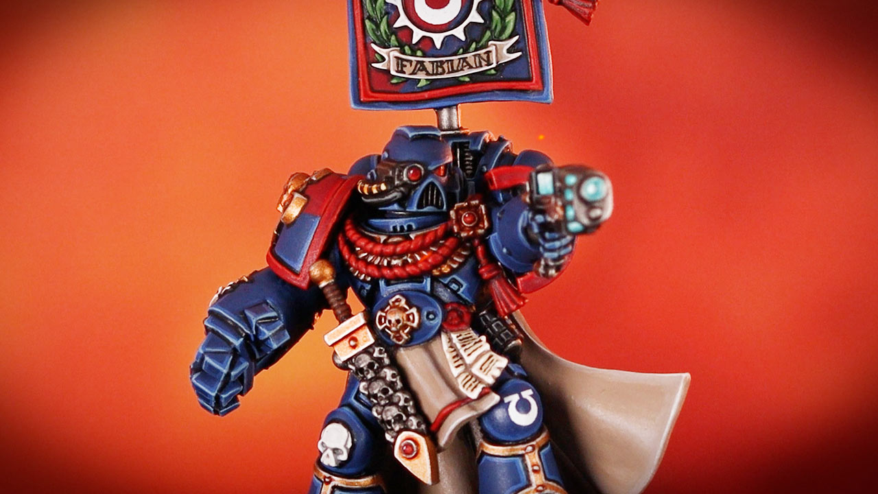 Close-up of an Ultramarines Captain Fabian of the 3rd Company, in front of an orange red background