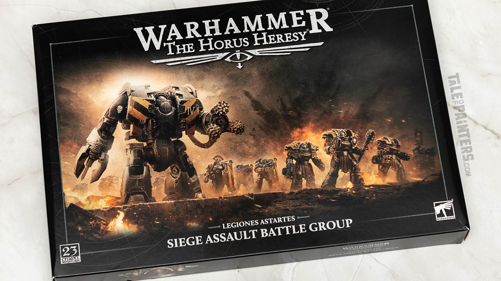 The Horus Heresy Legiones Astartes Siege Assault Battle Group box arranged on a white marble background, photographed for review purposes