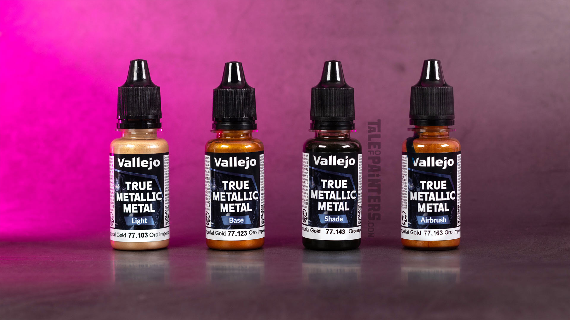 Vallejo True Metallic Metal Imperial Gold colour family bottles lined up: Light, Base, Shade, and Airbrush