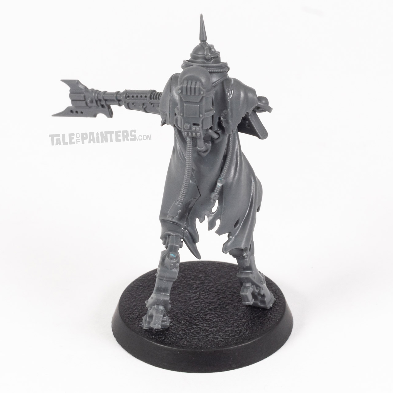 Back side of an assembled Skitarii Battle-Pilgrym model, revealing visible seam lines on the robes