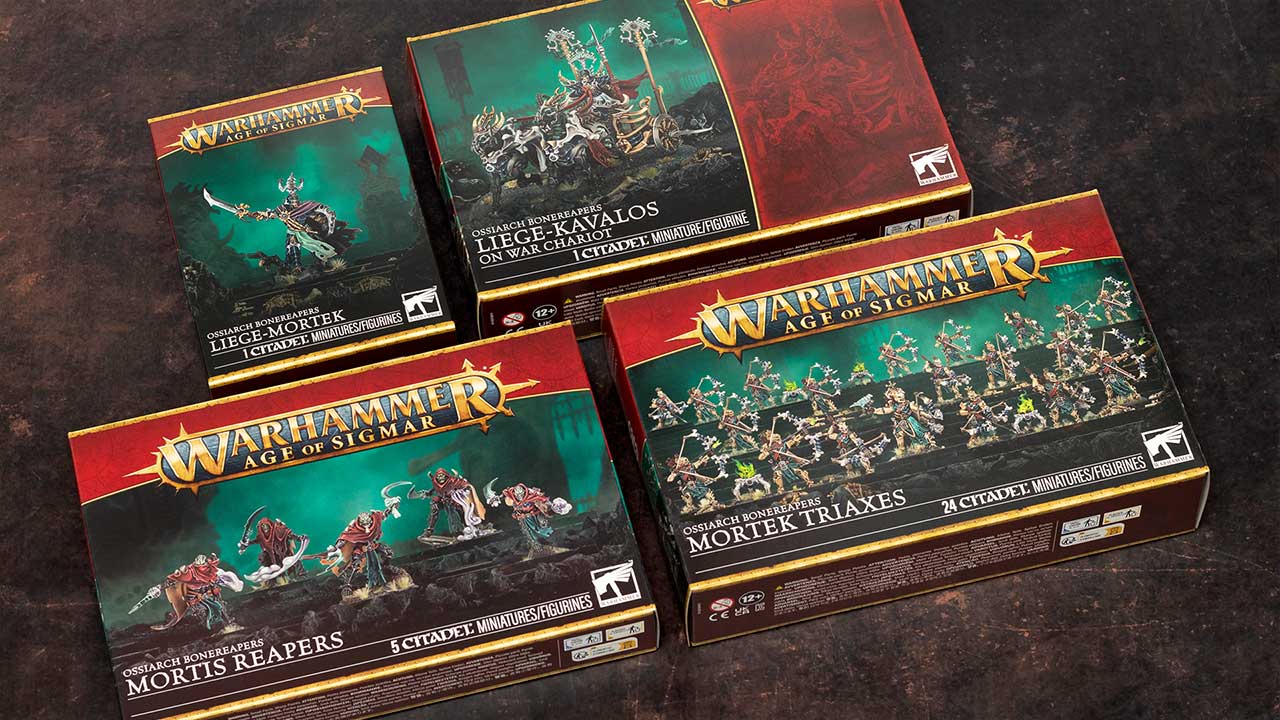 Age of Sigmar Ossiarch Bonereapers model kit boxes (Liege-Mortek, Liege-Kavalos on War Chariot, Mortis Reapers, and Mortek Triaxes arranged on a dark brown background, photographed for a review and unboxing