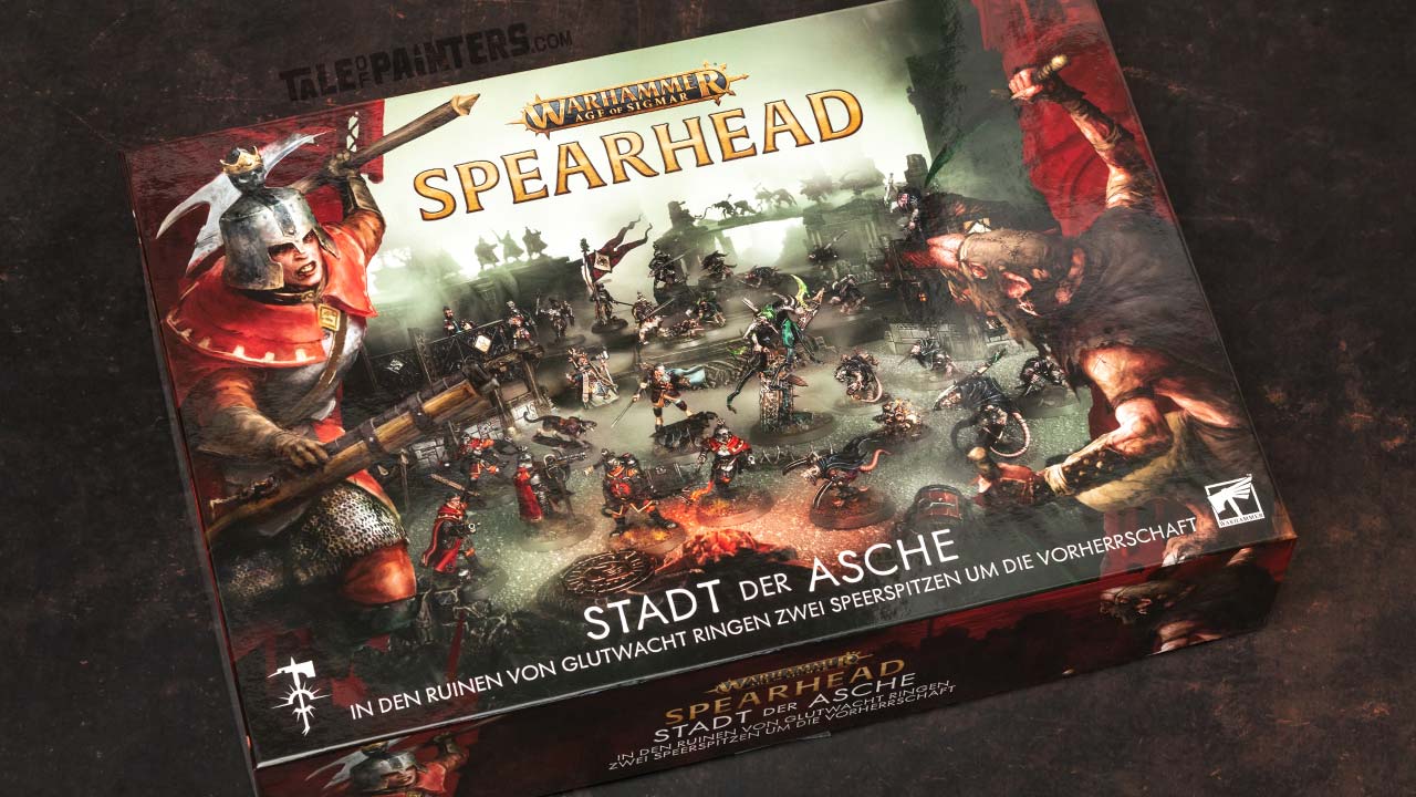 Warhammer Age of Sigmar Cities of Ash Spearhead box arranged on a dark brown background, photographed for a review and unboxing