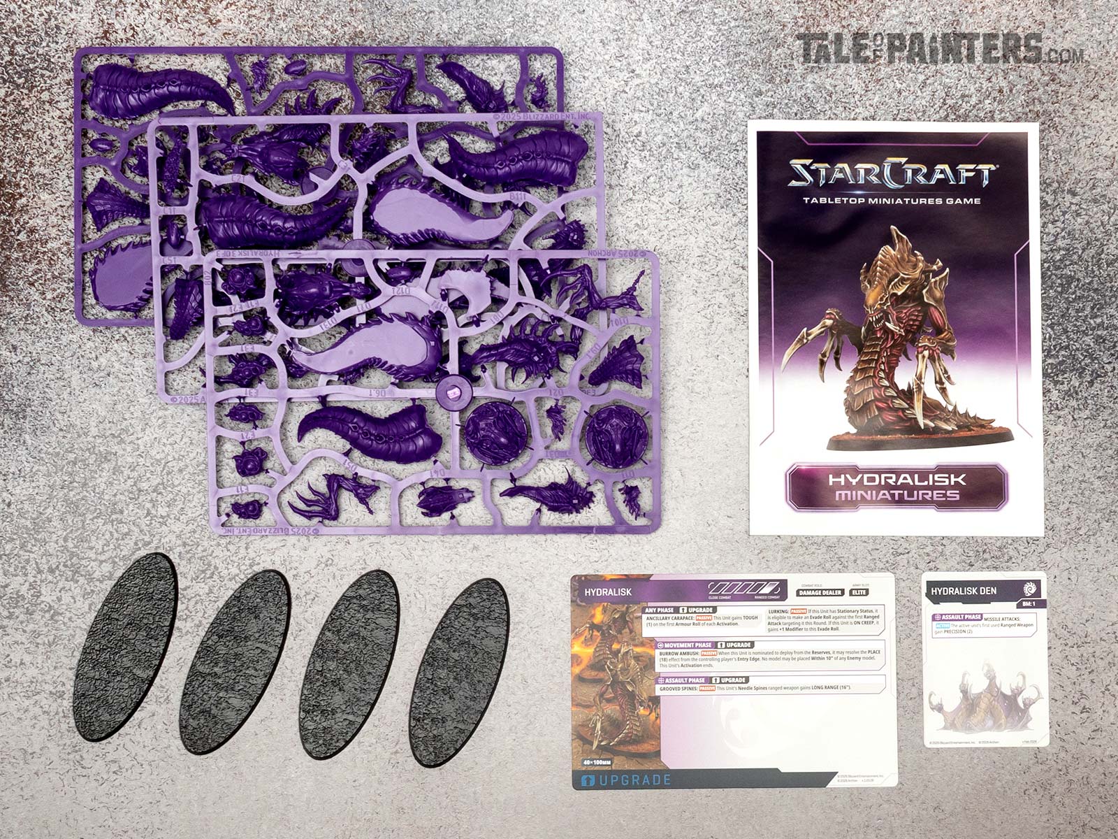 Top shot of all the box contents of the Zerg Hydralix Expansion set (sprues, bases, rule cards, assembly guide)
