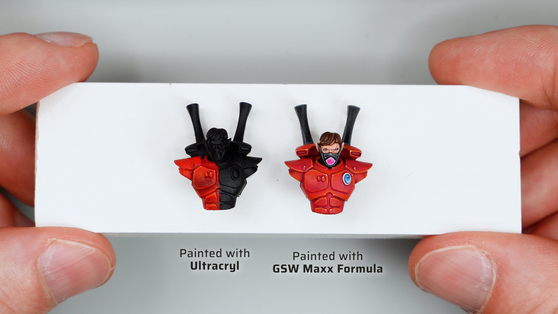 Two Stahly Aeldari bust test models, one painted with Ultracryl reds, the other painted in a Saim-Hann scheme with Green Stuff World Maxx Formula paints