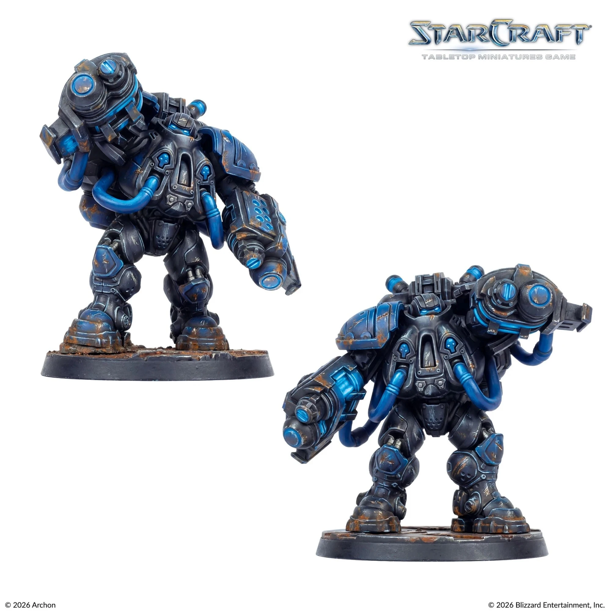 Two Terran Marauders models painted in blue for the Starcraft Tabletop Miniatures Game on white background