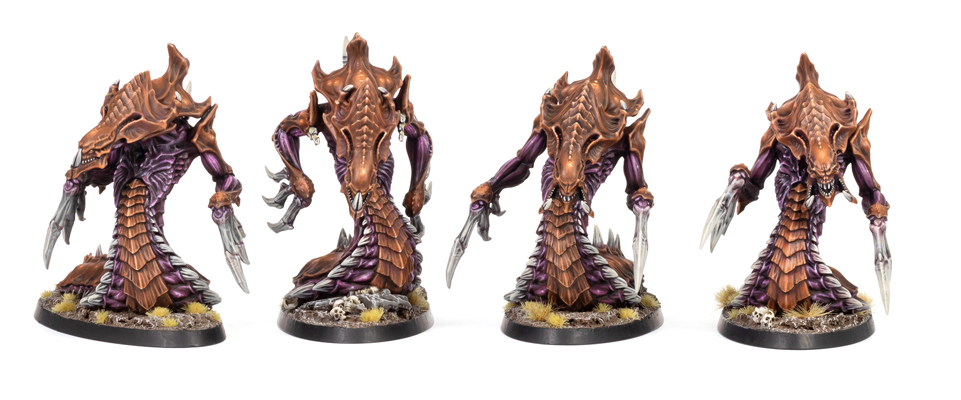 Four Zerg Hydralisk models from StarCraft: Tabletop Miniatures Game, painted in a moody brown and purple paint scheme by whiskerspaints, white background